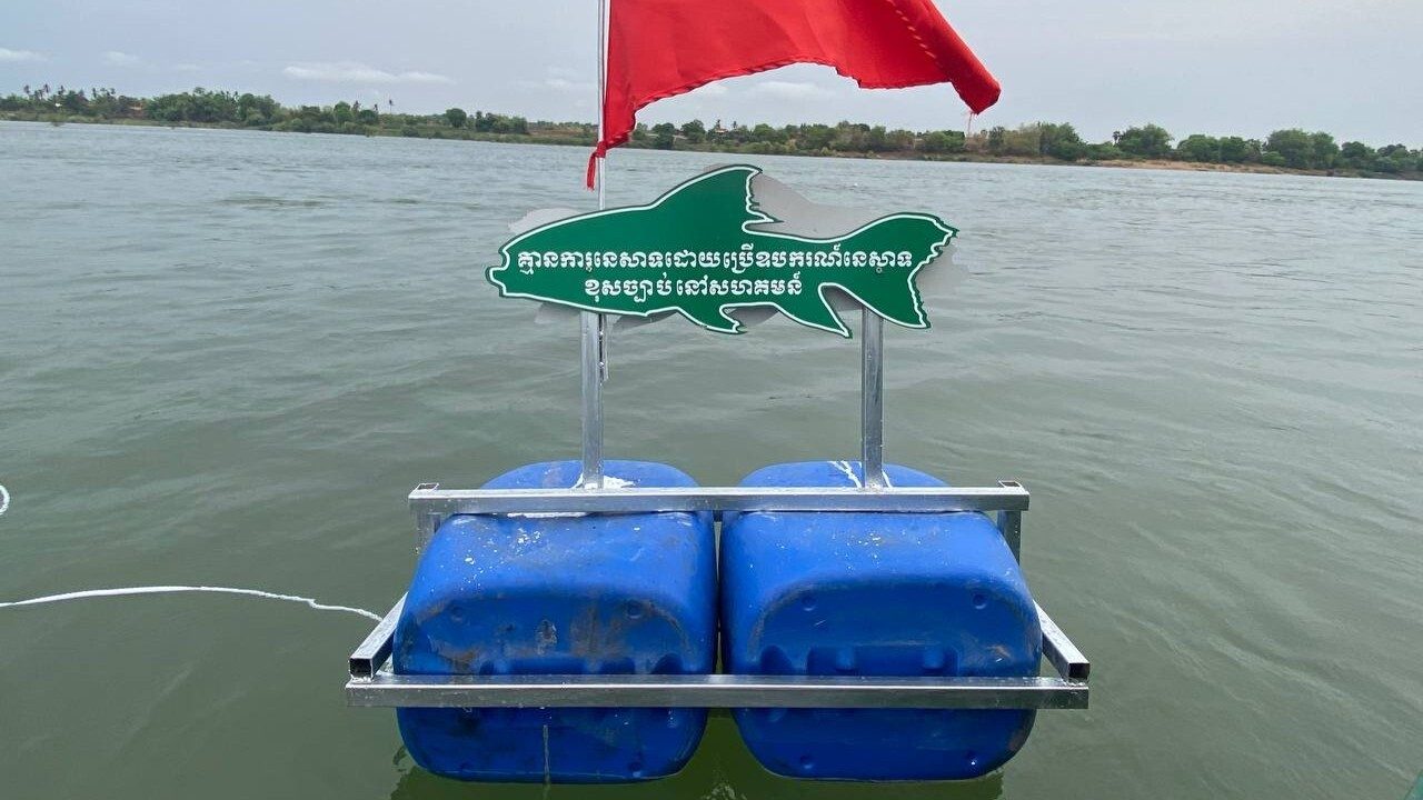 Sign on fish conservation within Stung Treng Ramsar Site.
