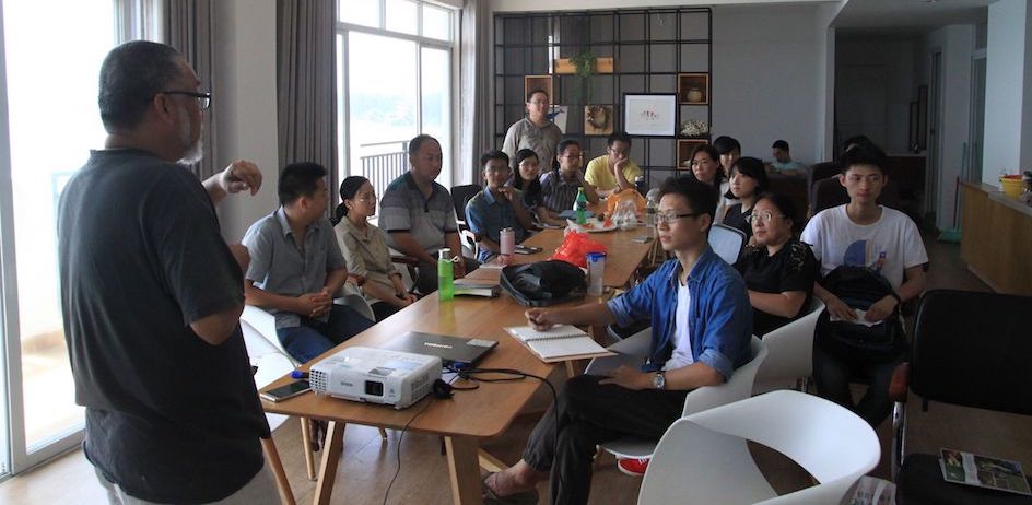 An expert in organizational development presents during the workshop. An expert in organizational development presents during the workshop.