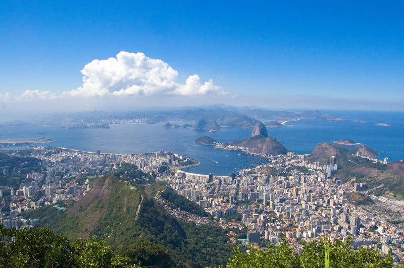 High-up view of Rio and the water it abuts.