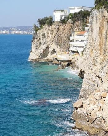 Sea and rocky cliff.