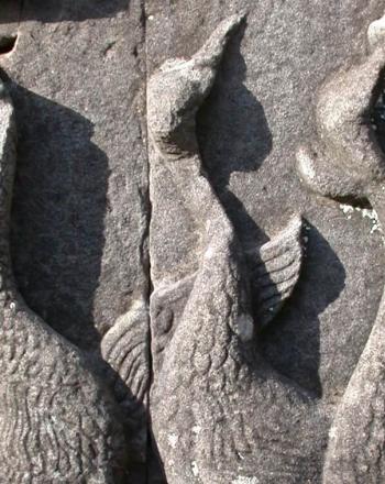 Three sarus cranes depicted on frieze.