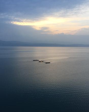 Lake Kivu at sunset under a tranquil sky