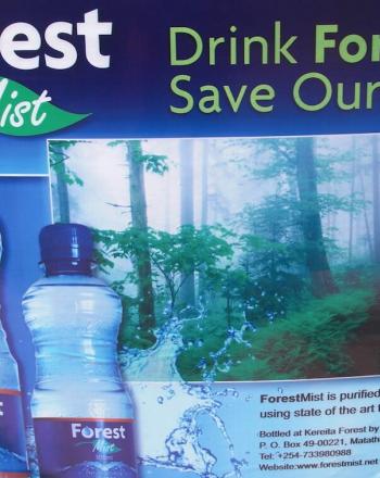 Sign advertising Forest Mist bottled water.