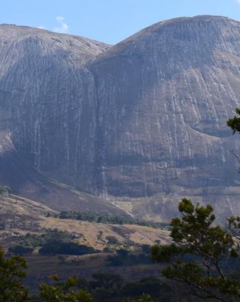 Rock face of mountain with two humps.
