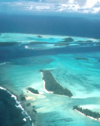 Arial view of Rennell Island surrounded by blue ocean in the Solomon Islands.