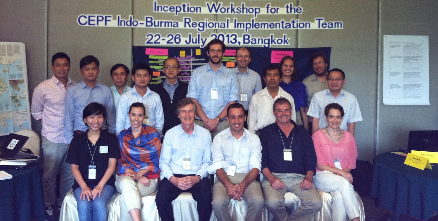 Group of 17 people standing/sitting for photo.